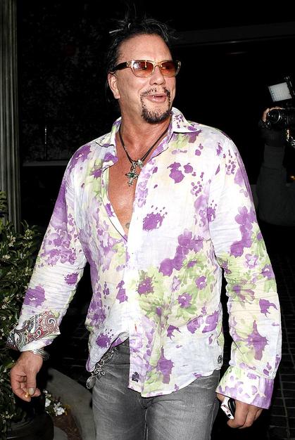 Who says only women can wear floral prints? Mickey Rourke rocked this blooming button-down for a night on the town.