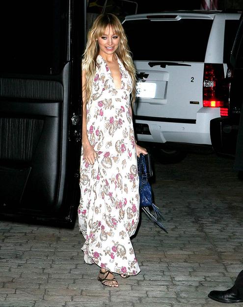 Nicole Richie hid her blooming baby bump under this halter dress.